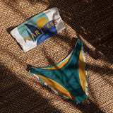Inspired Fearless Bandeau Top and Bottom Bikini in blue, flat lay with sailboat graphic