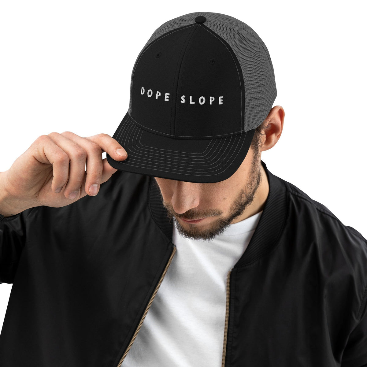 Après Ski Dope Slope Night Trucker Cap in Black/Charcoal, front view on model