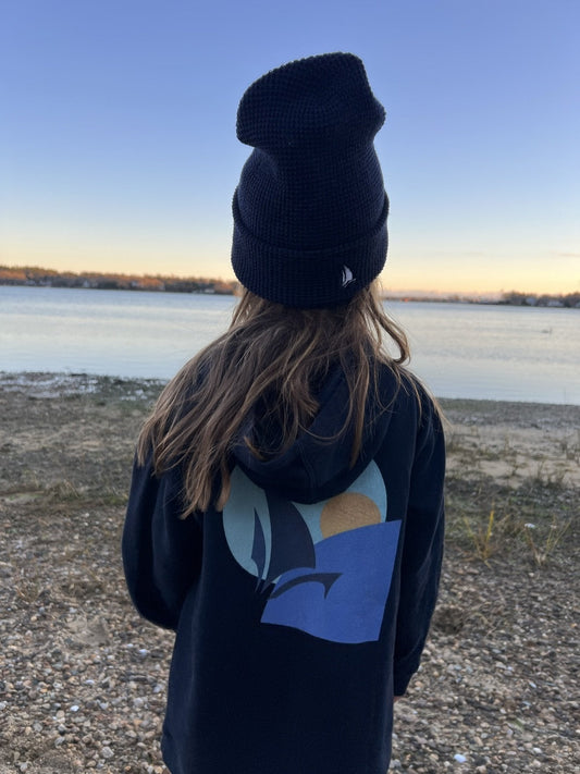 Classic Waffle Beanie in Navy, back view at the lake (real photo)