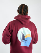 Back view of a maroon Sailer's hoodie with a sailboat sunset graphic